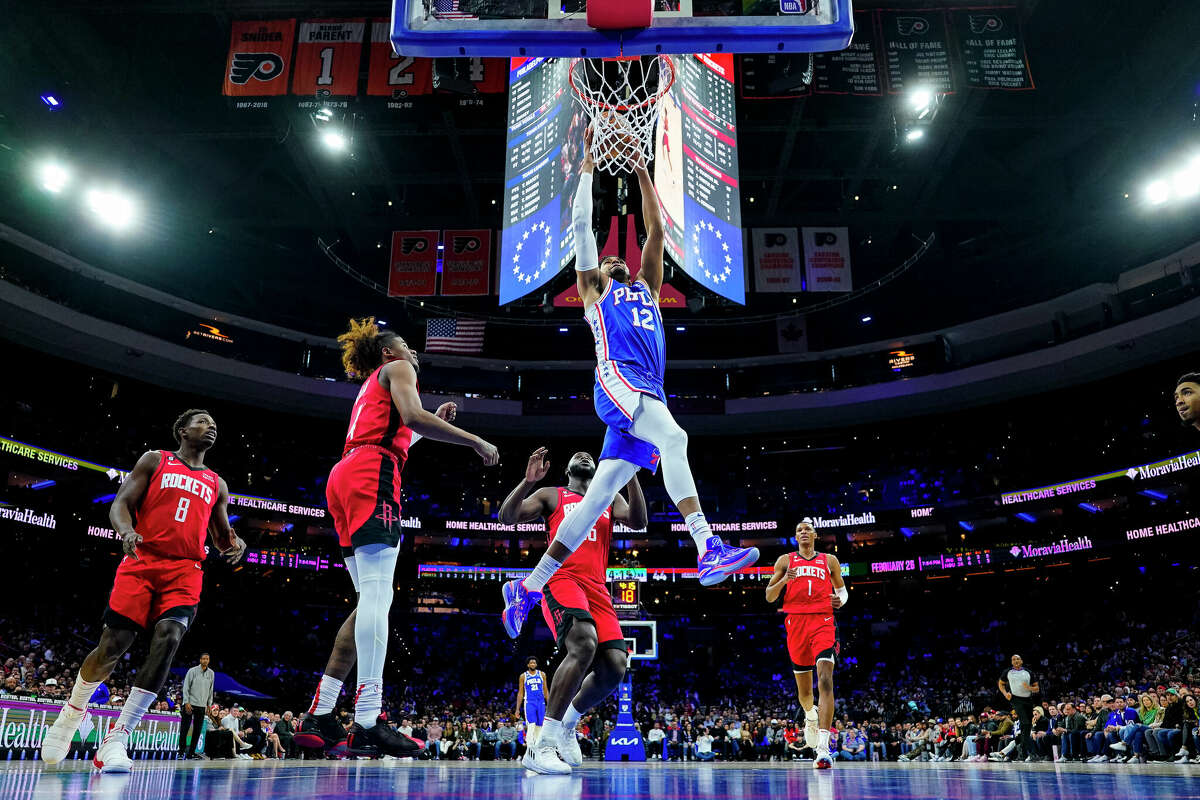 Philadelphia 76ers' Tobias Harris dunks the ball as the Houston Rockets look on during the first half of an NBA basketball game, Monday, Feb. 13, 2023, in Philadelphia. (AP Photo/Chris Szagola)