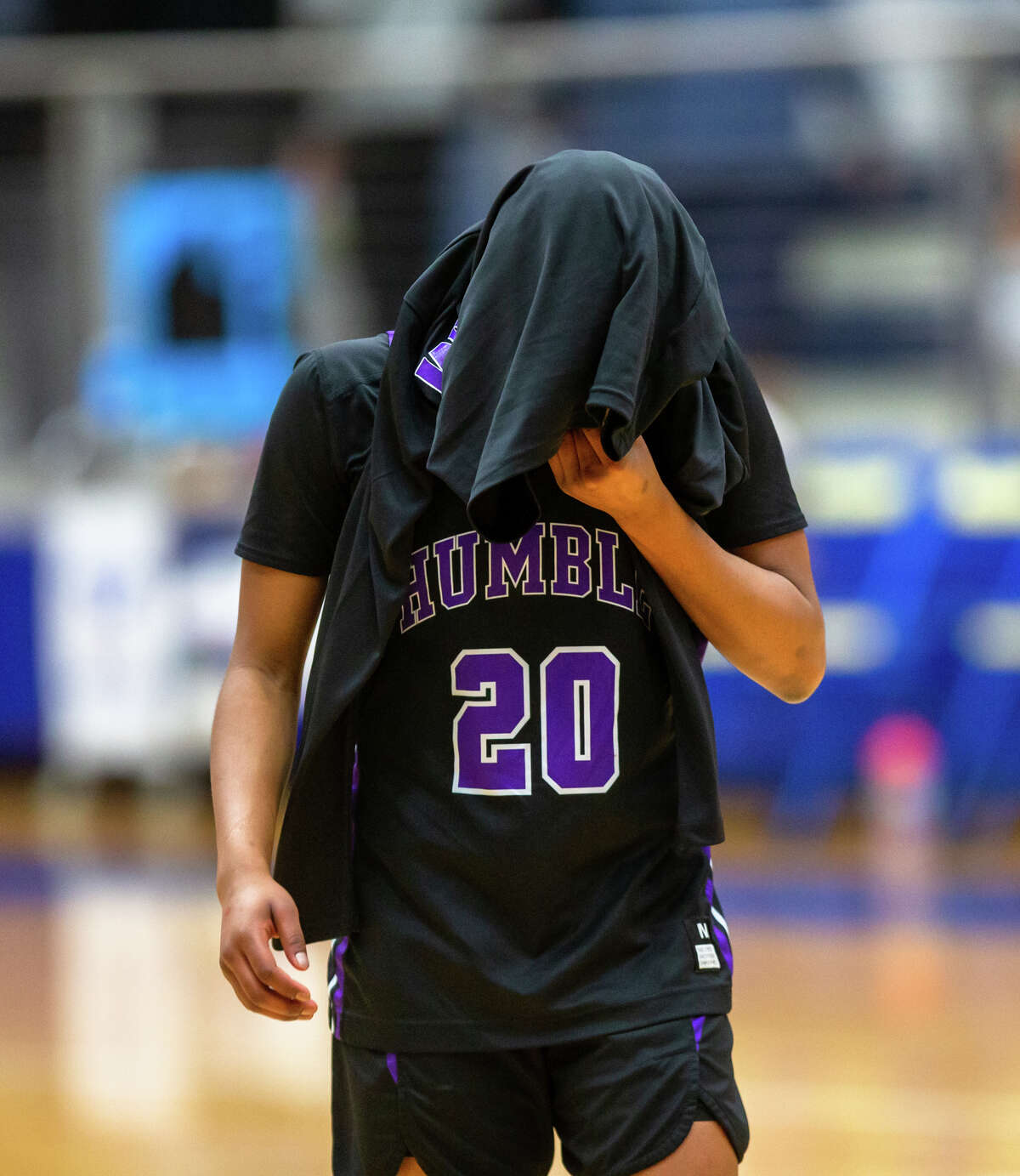 Humble Ja’Kaila Lee (20) covers her face walking off the court after a high school, Class 6A bi-district girls basketball playoff game Region III-6A Division II semifinal. Deer Park vs. Humble at Channelview High School, Monday, February 13, 2023, in Channelview. Deer Park defeated Humble 33-30.