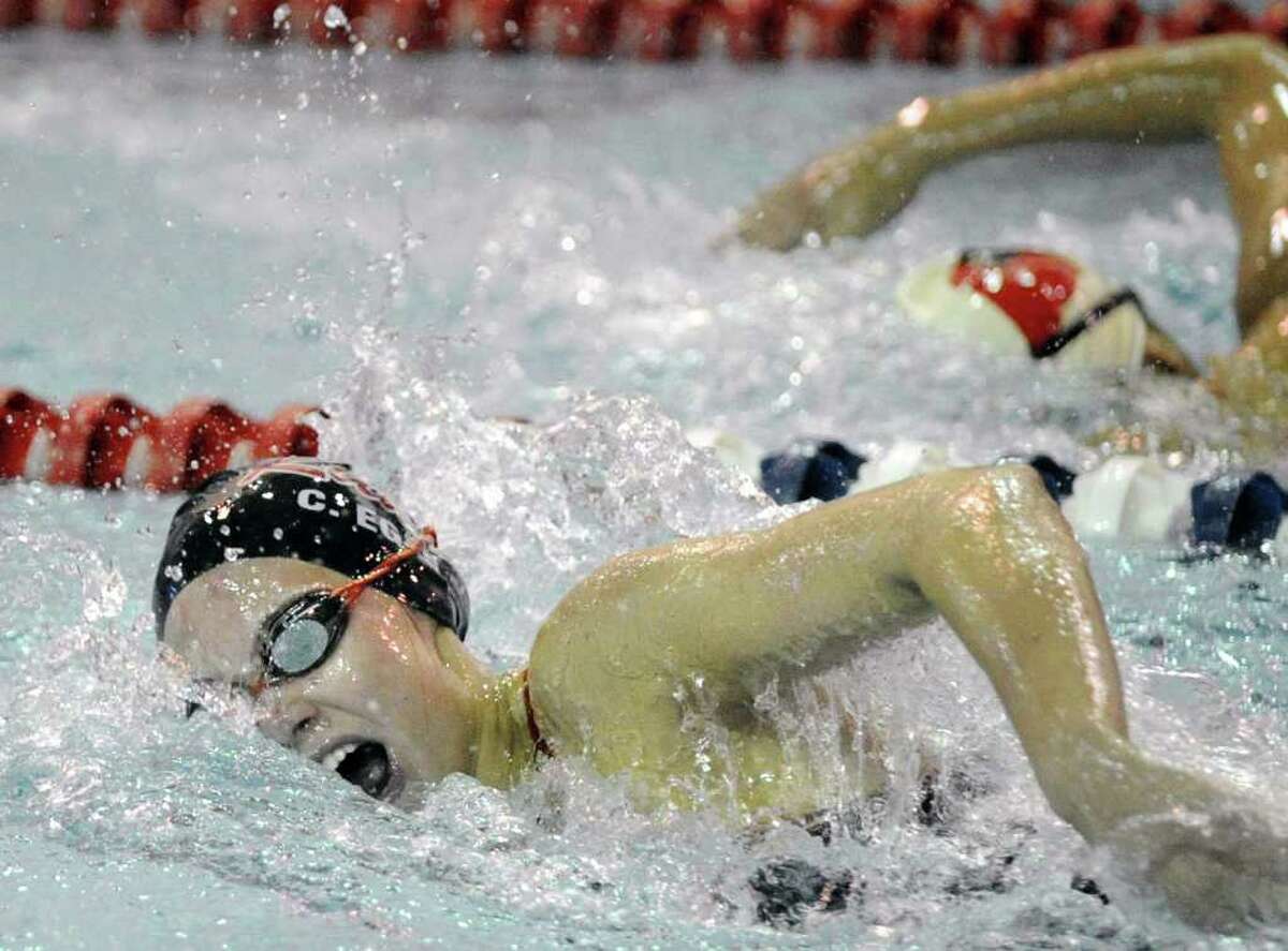 Cara Egan of the New Canaan High School girls swimming team competes in the 200 meter freestyle event against Greenwich High School at the YMCA of New Canaan, Wednesday afternoon, Oct. 13, 2010.