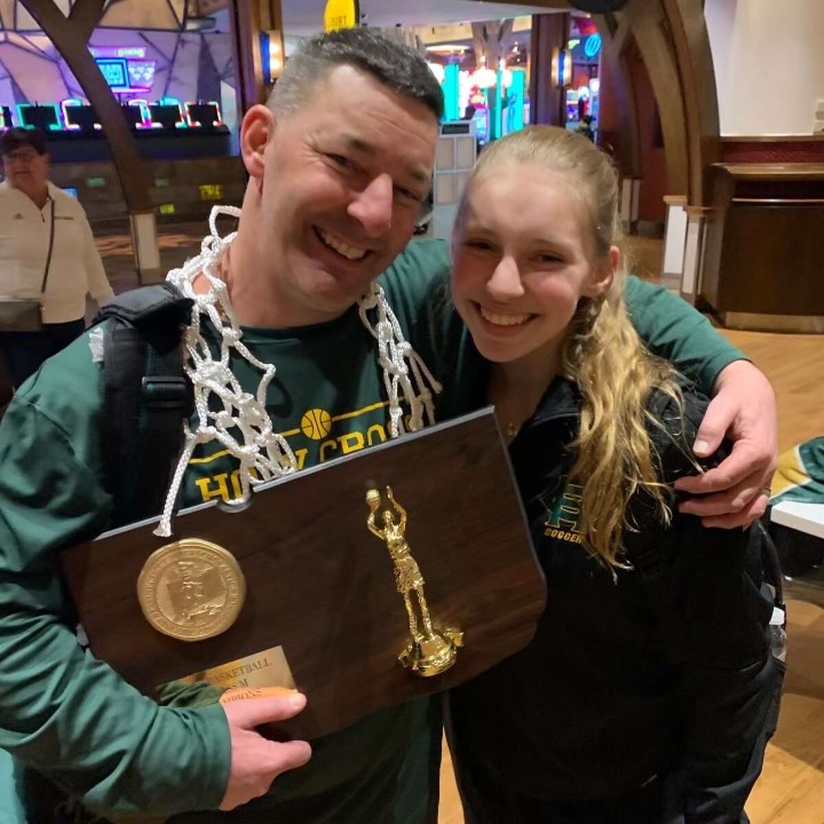 Holy Cross coach Frank Lombardo with his daughter Isabella who is a sophomore on the Holy Cross girls basketball team.