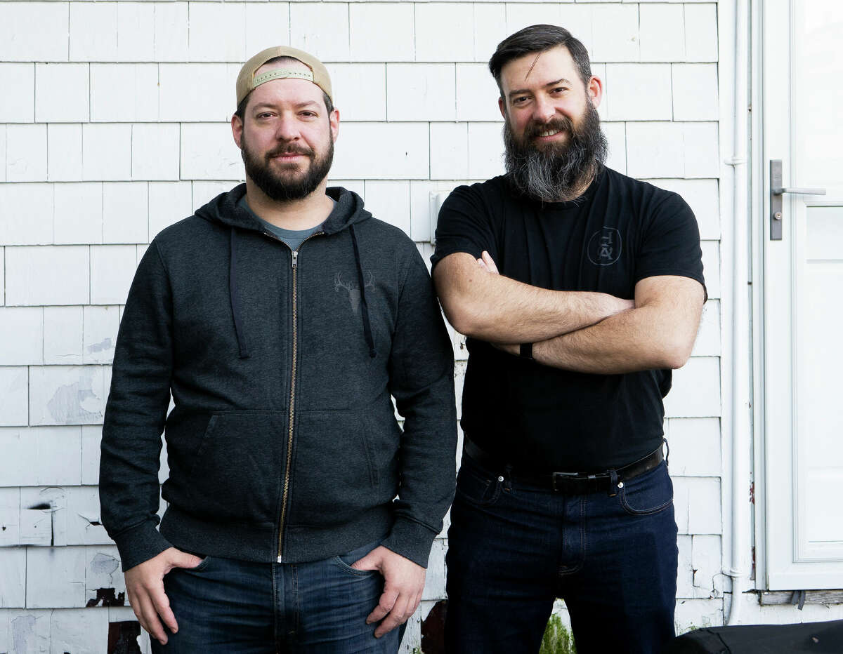 From left, brothers Henry Dziekan and Sam Dziekan creators and founders of Branford-based Hook & Arrow hot sauces.