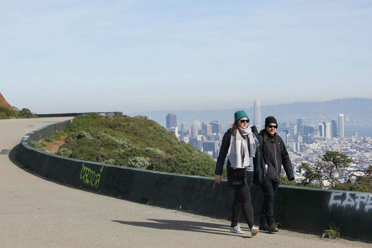 Pedestrians walk through Twin Peaks in San Francisco, Calif., on Wednesday, Feb. 1, 2023.
