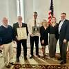 Dan Fisher, Deb Tartaglino and Karen Thomas were honored by the Torrington Elks Club Feb. 11 with their annual awards. 