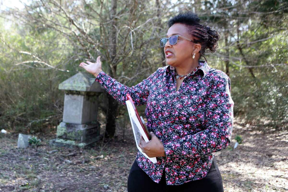 Cynthia Stubblefield Walker with the Montgomery County History Task Force recounts growing up with a curiosity about her family’s history at Rest Haven Cemetery, Tuesday, Feb. 14, 2023, in Willis. Walker has family members interred at the historical Black cemetery.