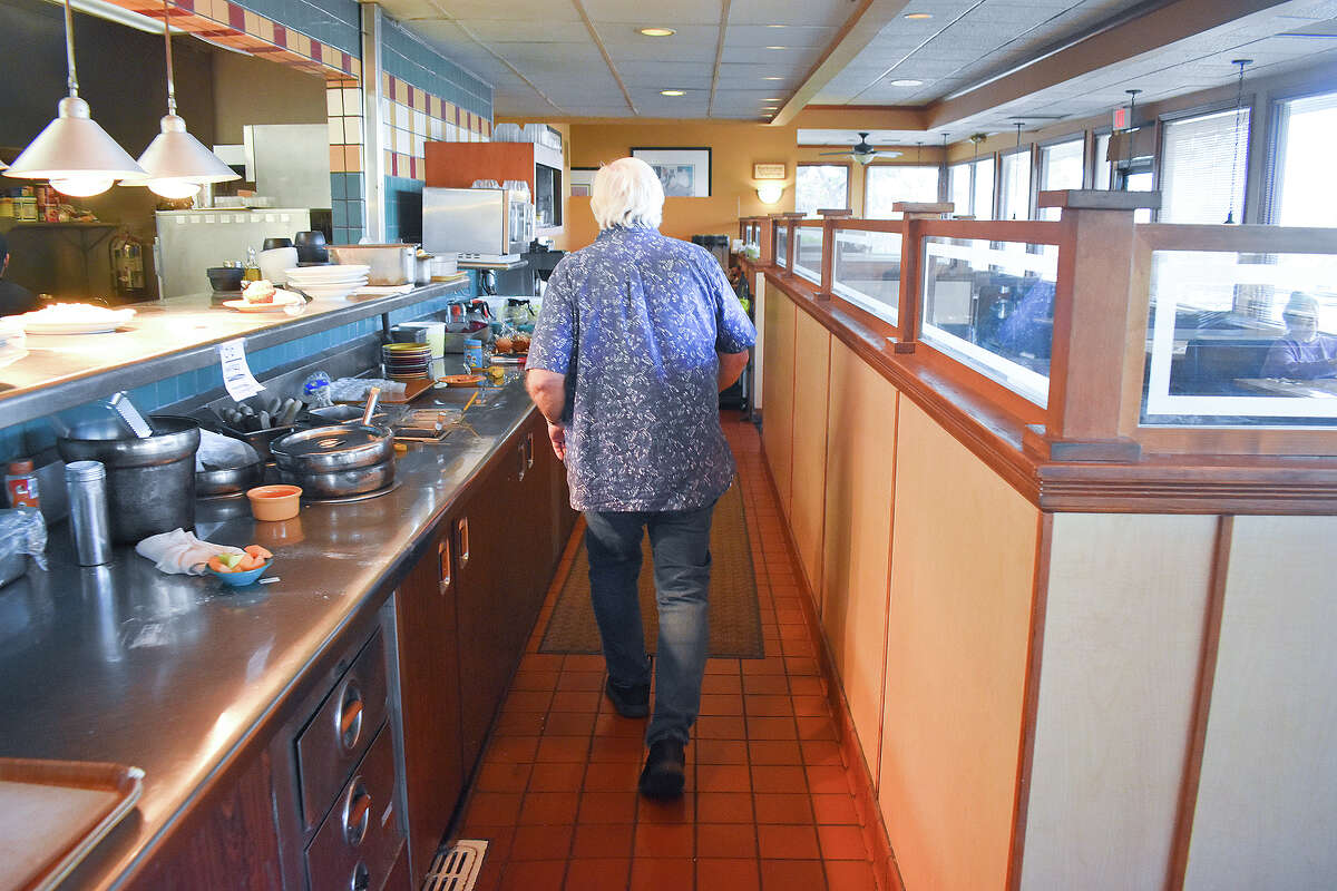 Larry Puder, owner of the Pismo Beach, Calif., Coco's, is calling it quits after owning and operating the restaurant for more than a quarter century. He's seen here on the restaurant's second-to-last day, Feb. 14, 2023.