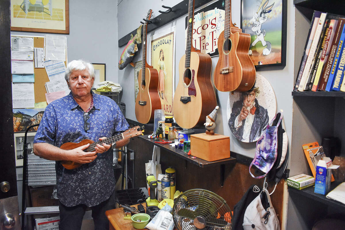 Coco's Pismo Beach owner Larry Puder used to serenade customers on his guitar or ukulele. His restaurant is closing for good on Feb. 15, 2023.
