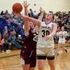 Duanesburg junior Allison O’Hanlon drives to the basket in front of Fonda-Fultonville senior Emma Crahan on Tuesday, Feb. 14, 2023, at Fulton Montgomery Community College in Johnstown, NY.