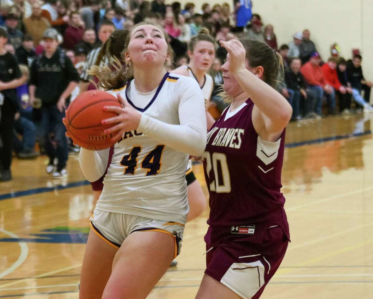 Duanesburg junior Alex Moses drives to the basket in front of Fonda-Fultonville senior Emma Crahan on Tuesday, Feb. 14, 2023, at Fulton Montgomery Community College in Johnstown, NY.