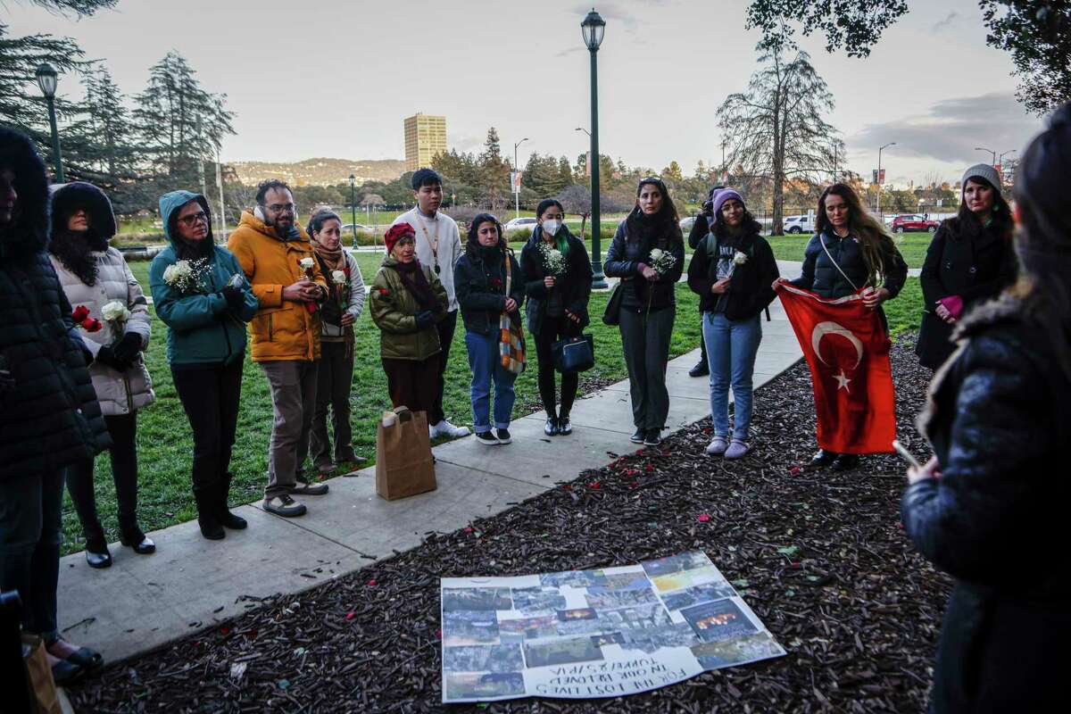 Dozens gather in Oakland on Tuesday to honor the more than 22,000 who have died and thousands who were injured in the 7.8 earthquake that shook Turkey and Syria on Feb. 6.  Local therapists Nermin Soyalp and Kholoud Nasser, organized the gathering and marched from Oakland’s Snow Park to the amphitheater at Lake Merritt.
