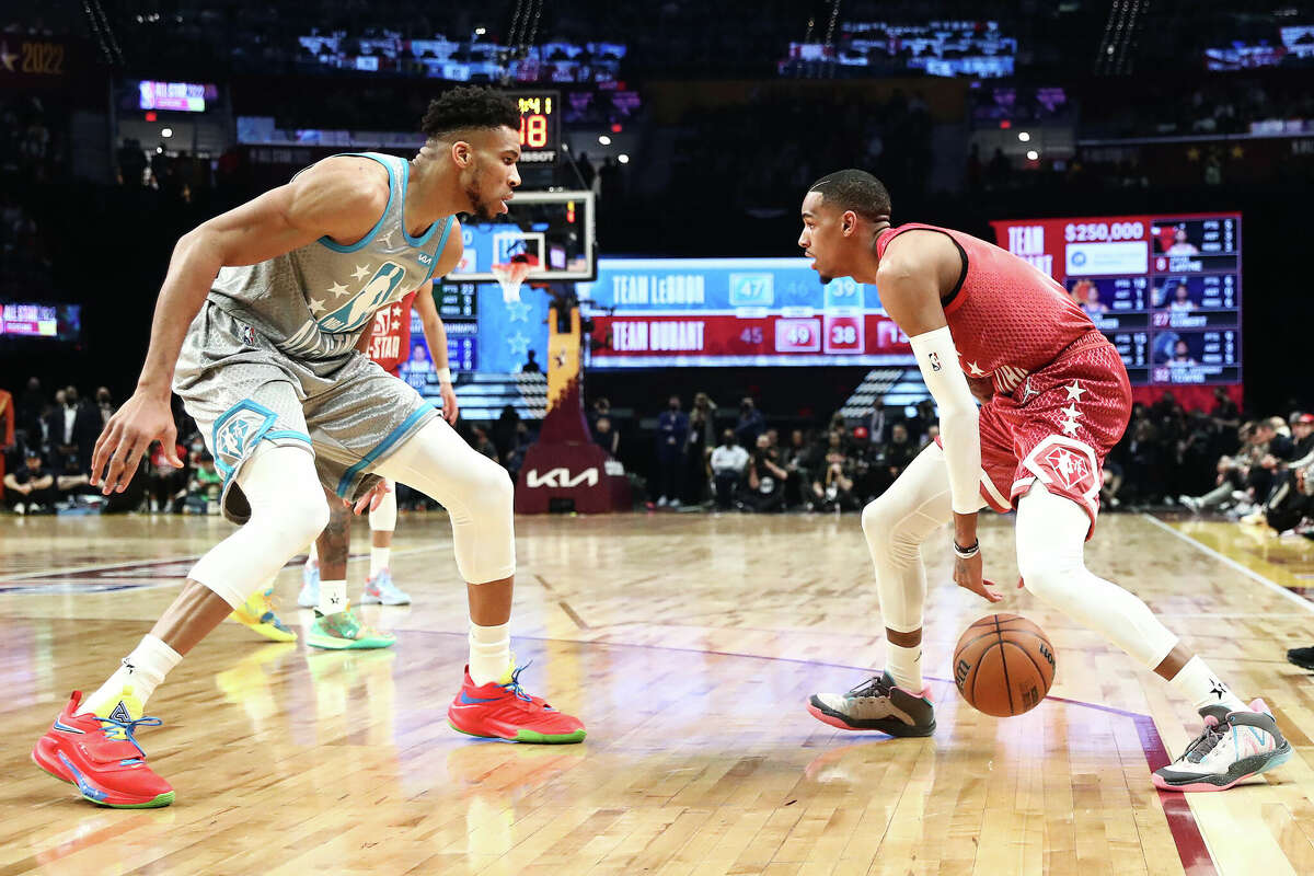 Dejounte Murray #5 of Team Durant dibbles against Giannis Antetokounmpo #34 of Team LeBron in the third quarter during the 2022 NBA All-Star Game at Rocket Mortgage Fieldhouse on February 20, 2022 in Cleveland, Ohio.