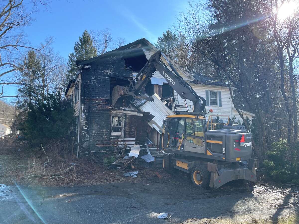 An abandoned house on Grove Street in New Milford caught fire and was torn down. 