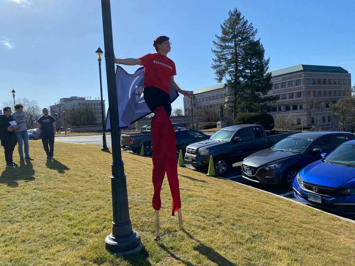 University of Connecticut supporters rally outside the State Capitol in Hartford on Wednesday, Feb. 15, 2023, ahead of a public hearing on Gov. Ned Lamont's proposed budget. UConn's president has said the funding would fall short of what the school needs.