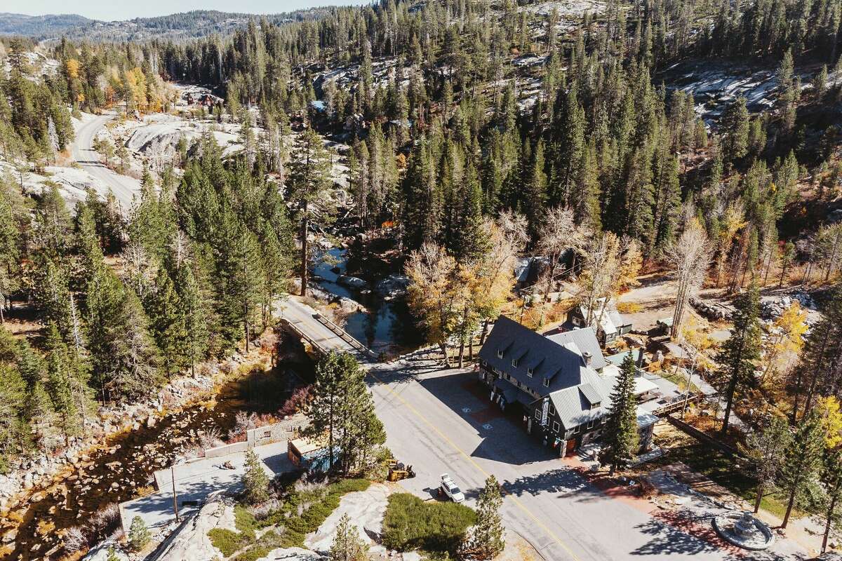 An aerial view of the Rainbow Lodge, nestled into the trees of Tahoe National Forest.