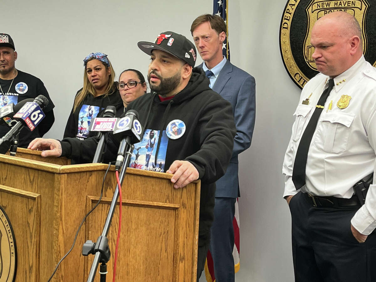Ernie Negroni Sr., father of Ernie Negroni-Feliciano Jr., speaks at a press conference Wednesday after police announced an arrest in Negroni-Feliciano's death.