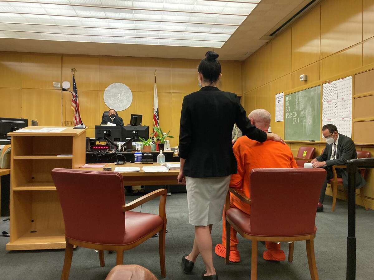 San Francisco Public Defender Sierra Villaran (left) speaks during a court appearance for her client, Darron Price (seated), who is accused of blowing up a Sunset District home, killing a woman inside. 
