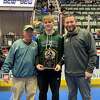 Hudson Falls wrestler Jesse Mullis, center, after winning the Division II sectional final at 172 pounds on Saturday, February 11, 2023 at Cool Insuring Arena in Glens Falls.