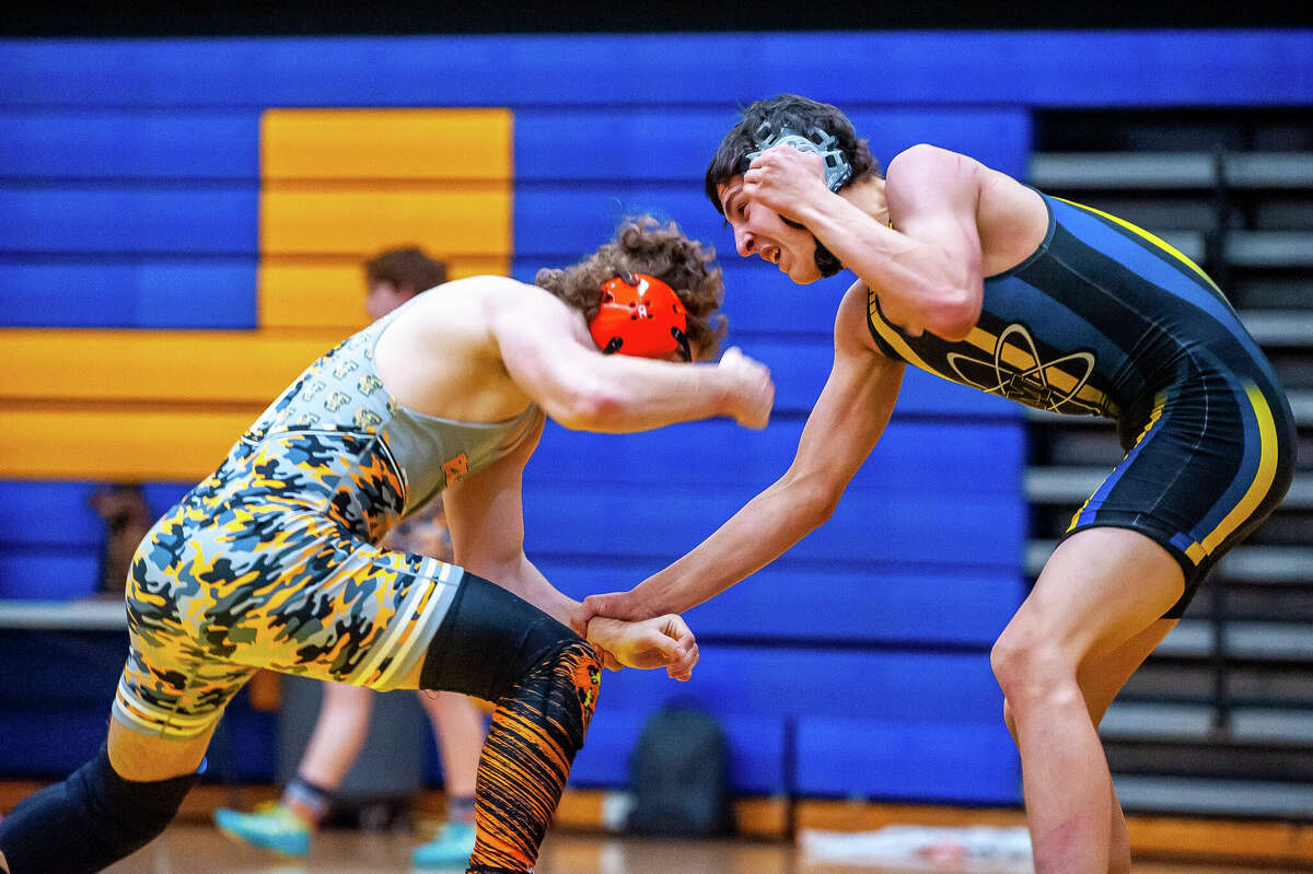 PHOTOS Midland High School grapples in regional wrestling tournament