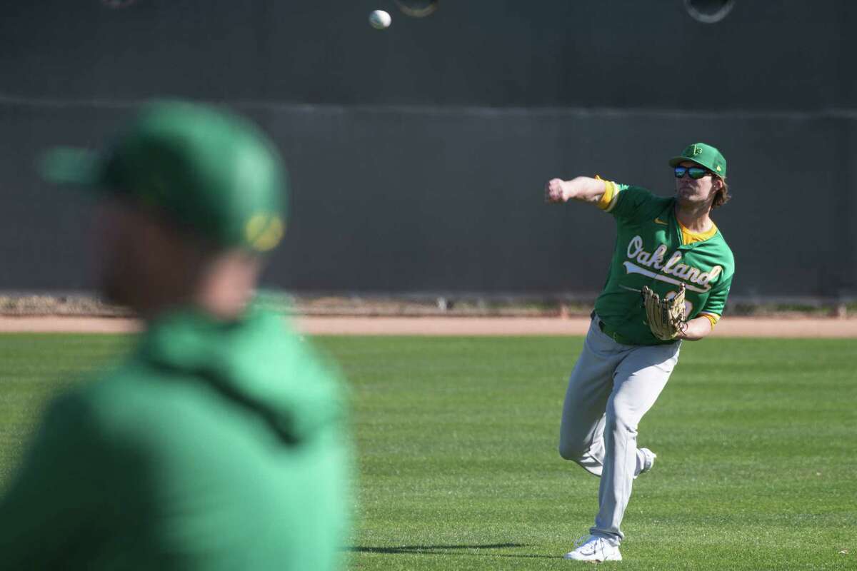 Drew Steckenrider warms up during a pitchers and catchers practice at Hohokam Park in Mesa, Arizona, U.S., February 15, 2023.