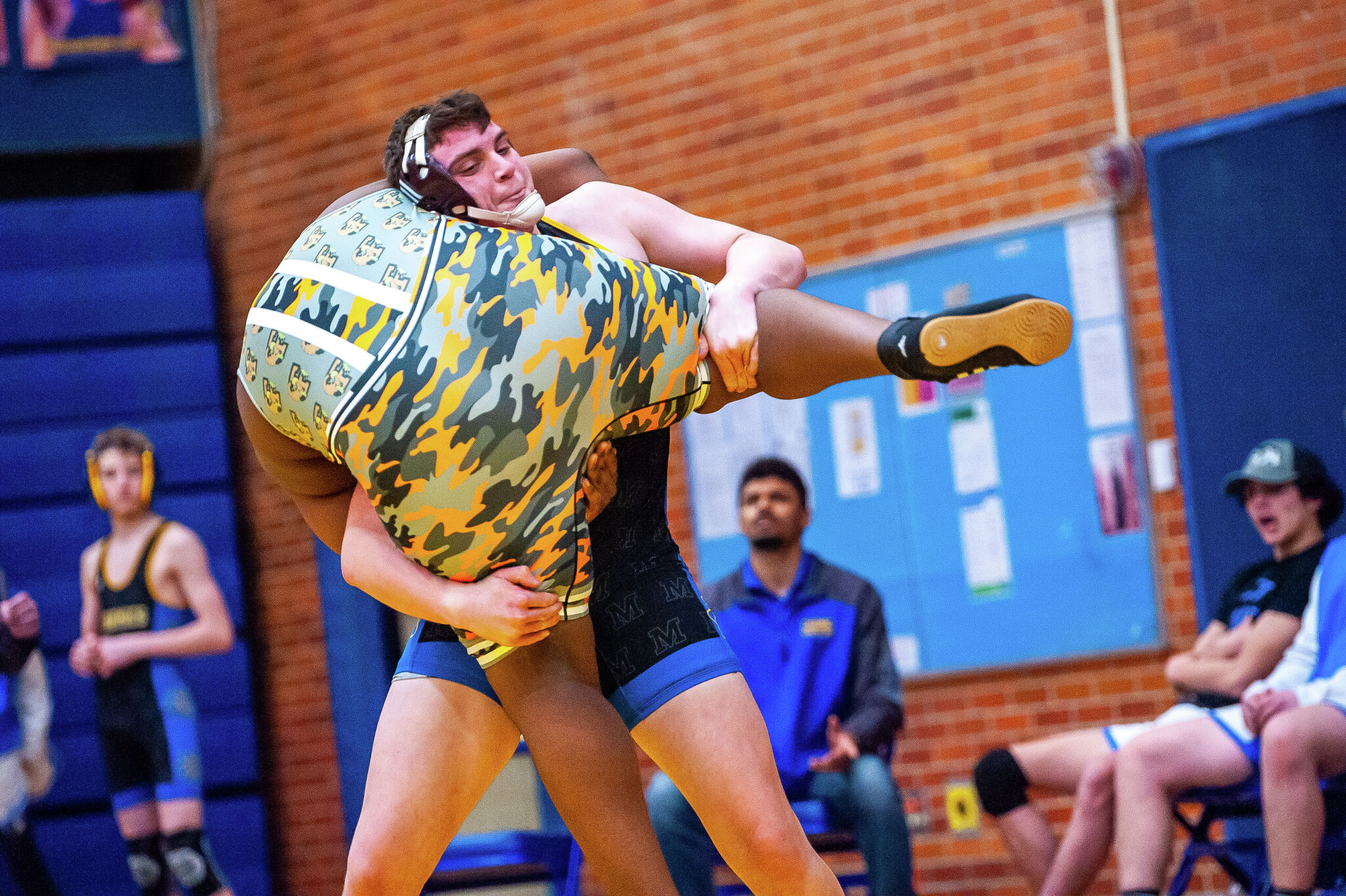 PHOTOS Midland High School grapples in regional wrestling tournament