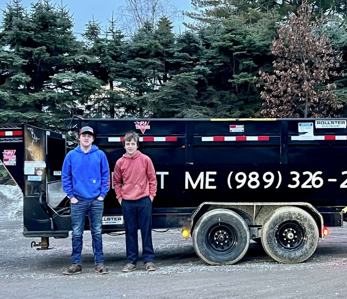 Eric (right) and Kyle (left) Ignash are high school students who have started their own dumpster rental business in the city of Caseville.