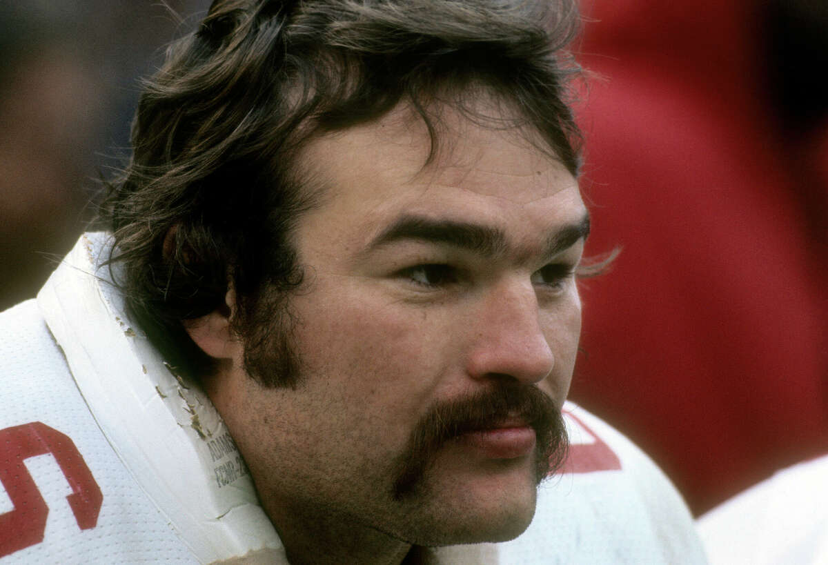 CIRCA 1977: Conrad Dobler #66 of the St. Louis Cardinals watches the action from the bench during an NFL football game circa 1977. Dobler played for the Cardinals from 1972-77. (Photo by Focus on Sport/Getty Images)
