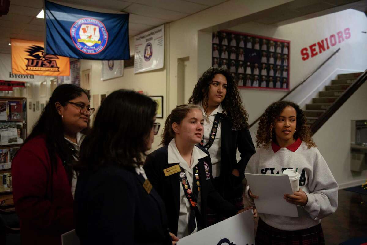 Kaitlyn Lomas, Devyn Moore, Lola Sanchez and Melanie Harrell gather before celebrating Day of the Girl.