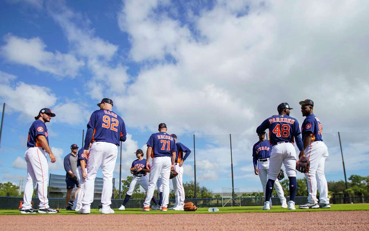Several Houston Astros pitchers on the field during the first day of workouts for pitchers and catchers at the Astros spring training complex at The Ballpark of the Palm Beaches on Thursday, Feb. 16, 2023 in West Palm Beach .