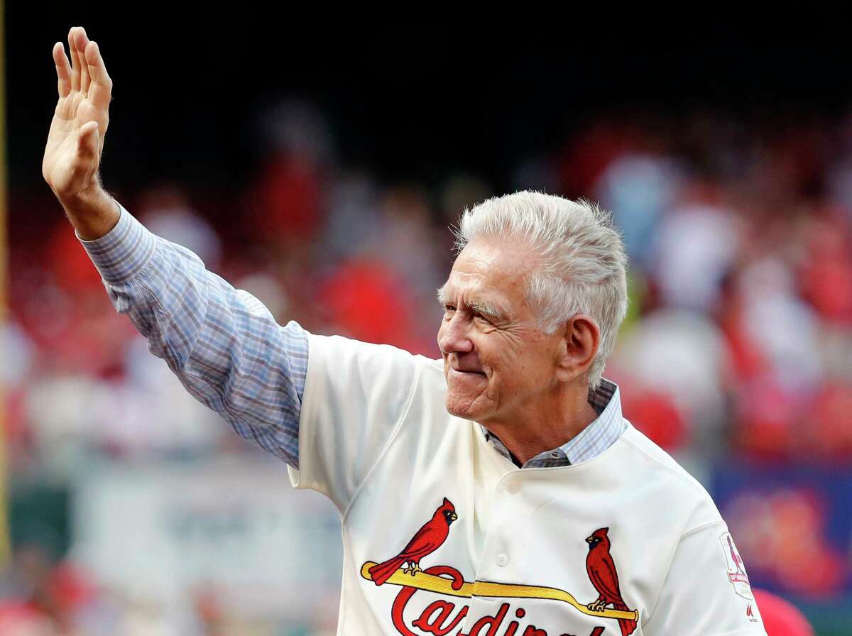 FILE - Tim McCarver, a member of the St. Louis Cardinals' 1967 World Series championship team, takes part in a ceremony honoring the 50th anniversary of the victory before the start of a baseball game between the St. Louis Cardinals and the Boston Red Sox on May 17, 2017, in St. Louis. McCarver, the All-Star catcher and Hall of Fame broadcaster who during 60 years in baseball won two World Series titles with the St. Louis Cardinals and had a long run as the one of the country's most recognized, incisive and talkative television commentators, died Thursday morning, Feb. 16, 2023, in Memphis, Tenn., due to heart failure, baseball Hall of Fame announced. He was 81.