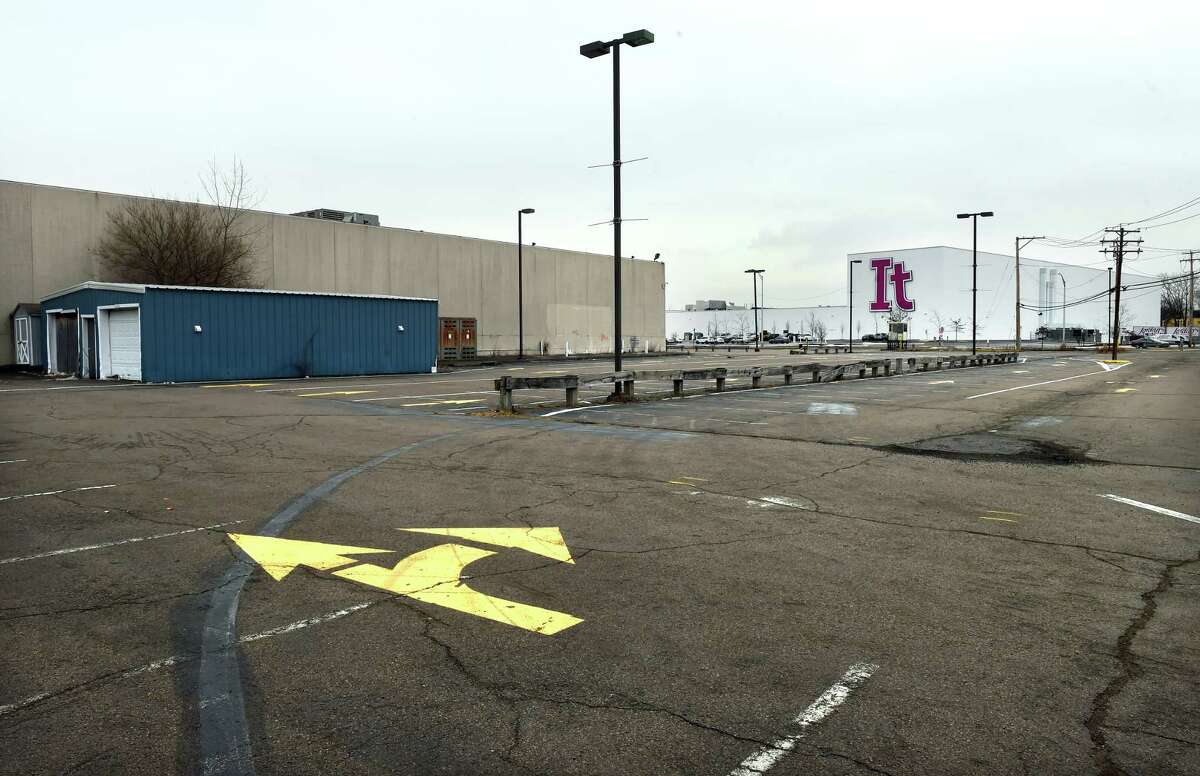 The parking lot in back of the former location of Gateway Community College in New Haven on February 16, 2023. In the background at right is Jordan's Furniture.