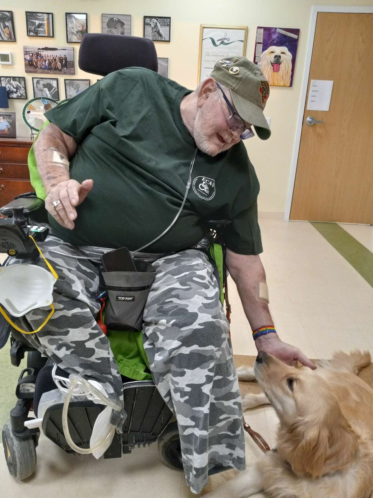 Winsted's Educated Canines Assisting with Disabilities held a graduation ceremony for six veterans this week, including Tom Williamson and his service dog Peaches. 