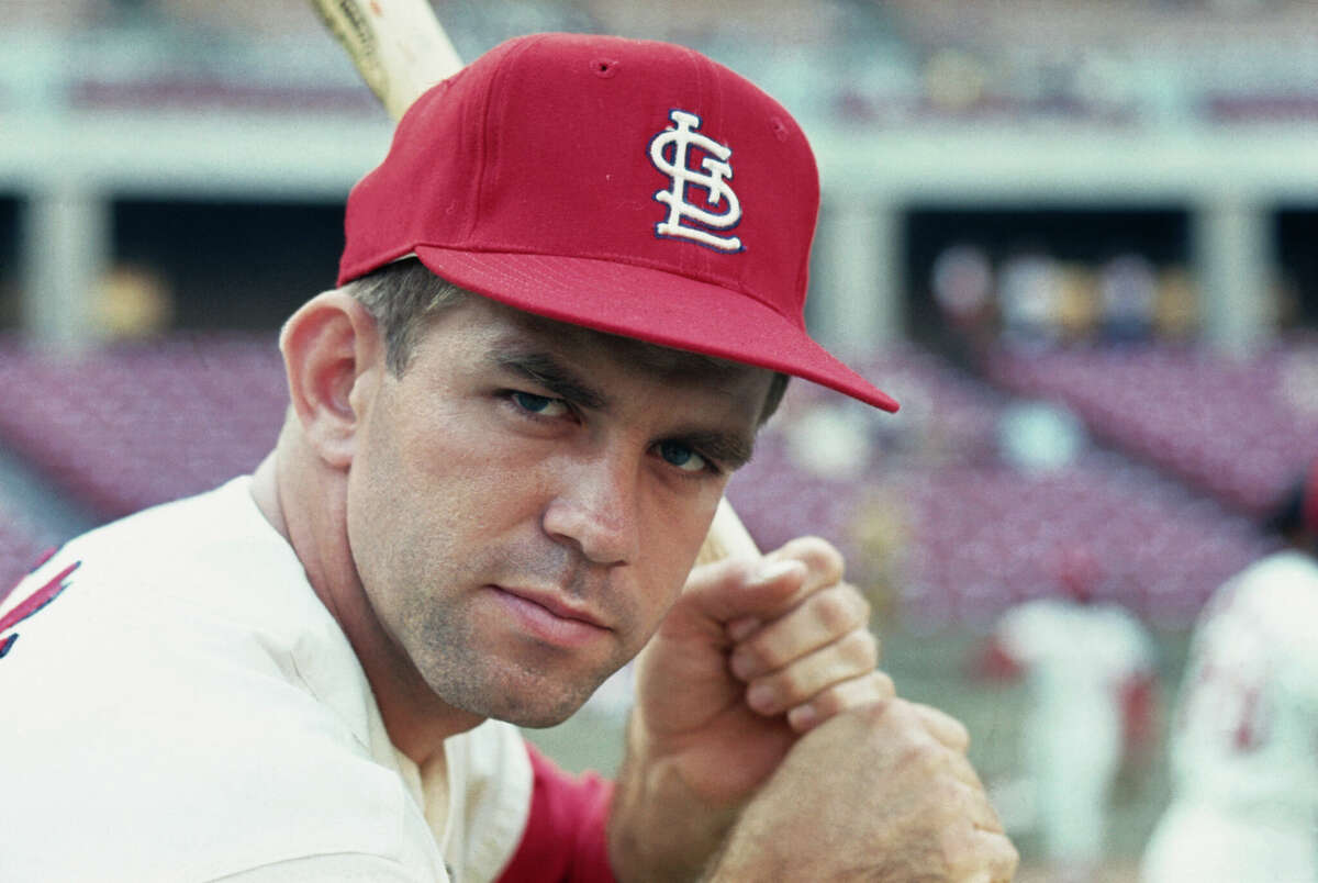 (Original Caption) St. Louis Cardinals catcher, Tim McCarver clutches his bat, August 1967. McCarver is hitting 308 and is having one of his best years with the team. McCarver a stalwart behind the plate is looking forward to his 2nd World Series as he was with the Cardinals in 1964 when the Cards beat the Yankees.