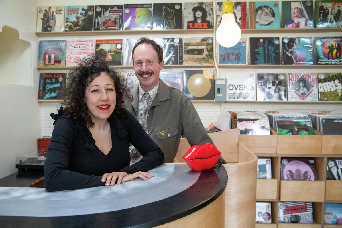 Left to right, Hannah Lew and Andrew Kerwin co-own Contact Records which recently opened a new location in Temescal Alley in Oakland, Calif., on Feb. 14, 2023.