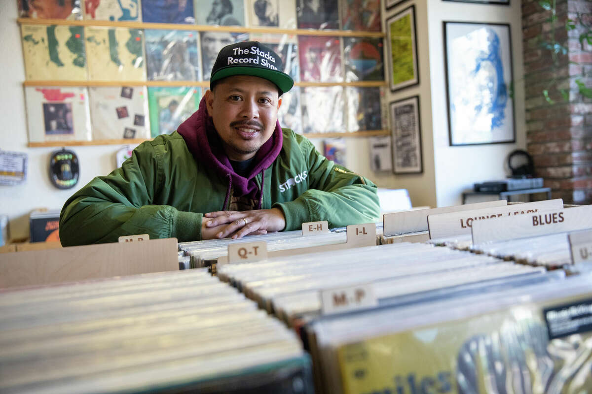 Owner Gabe Dela Cruz inside The Stacks Record Shop in Hayward, Calif., on Feb. 14, 2023.