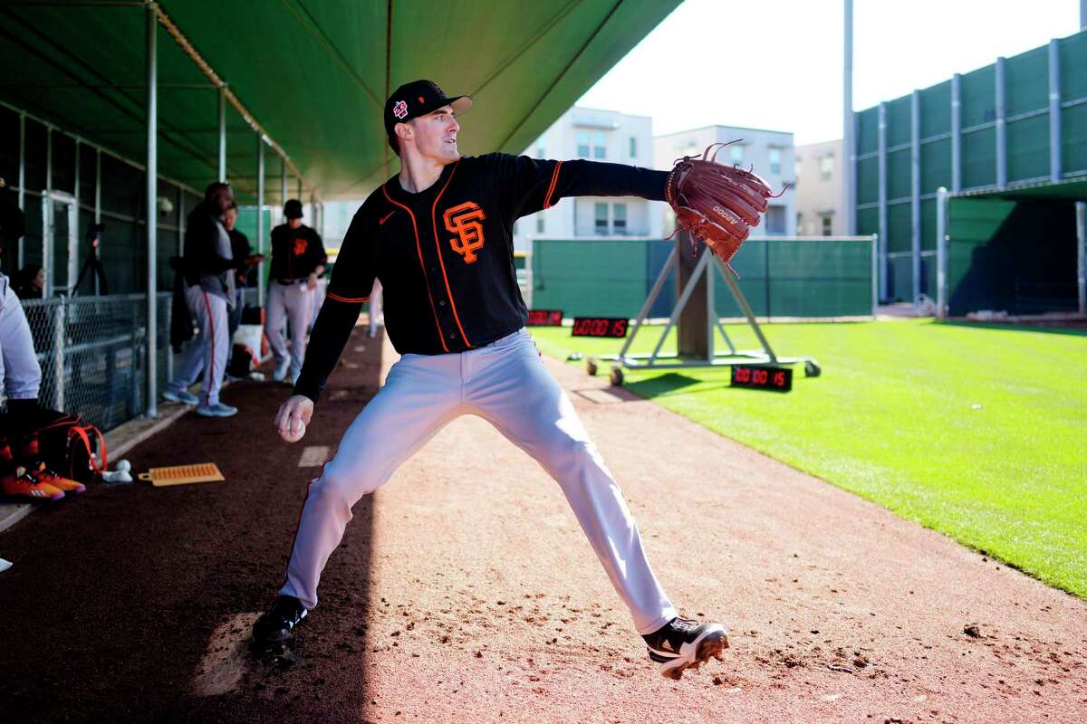 San Francisco Giants pitcher Ross Stripling throws during a Spring Training workout in Scottsdale, Ariz. on Thursday, Feb. 16, 2023.