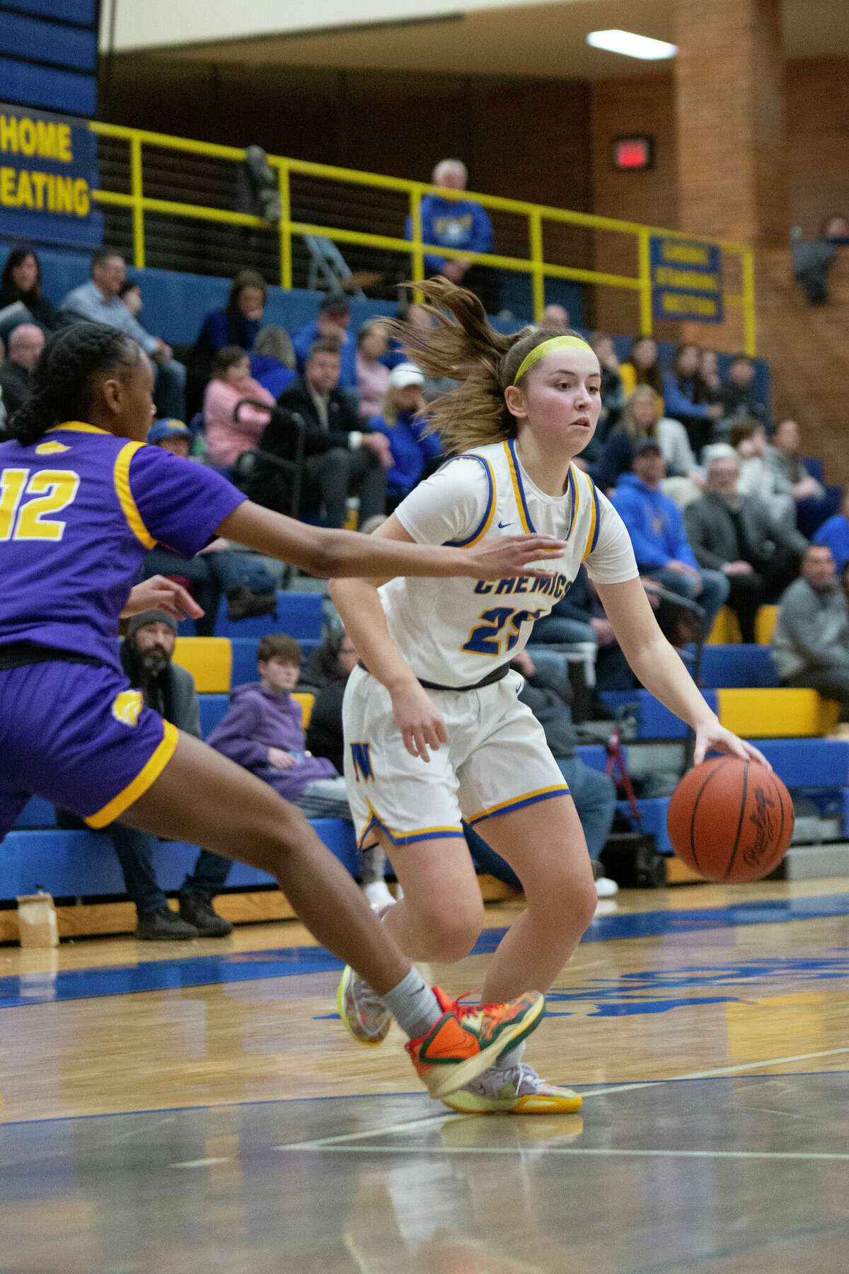 Midland High's Payton Palmer attacks off the dribble during a Feb. 16, 2023 game against Bay City Central. Palmer had 15 points in Tuesday's district quarterfinal win over the Wolves.