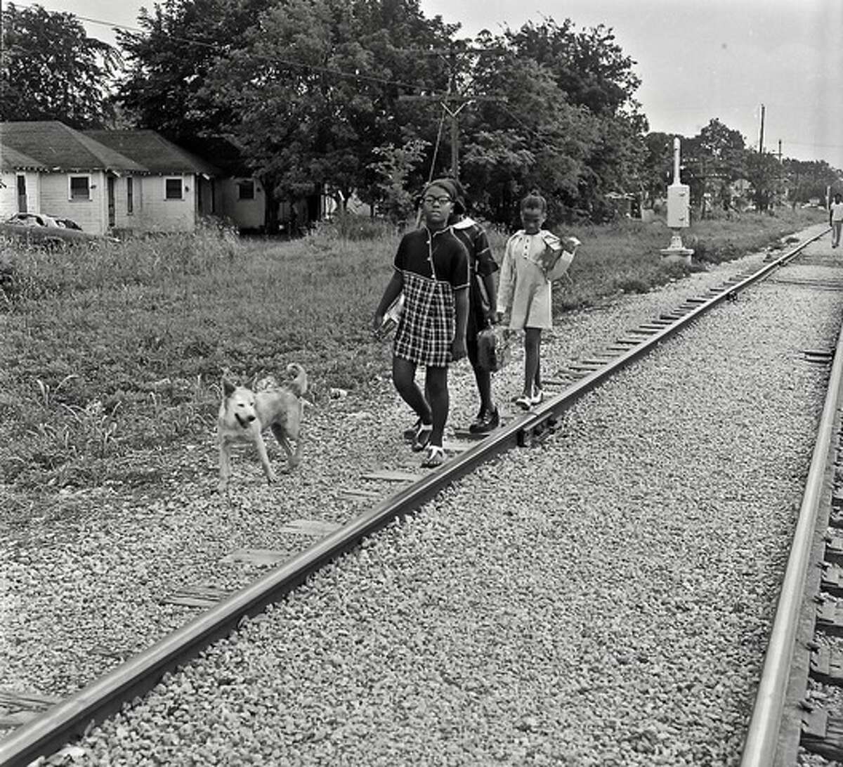 The Columbia Tap Bike Trail, which travels through Third Ward, holds a deep history. Formerly called the Brazoria Railroad, or “Sugar Road,” it was built by enslaved Black people from Brazoria plantations. Today, the community struggles to gain funding and support to beautify the trail.This photo was taken in 1973 by acclaimed Houston photographer Earlie Hudnall Jr. 