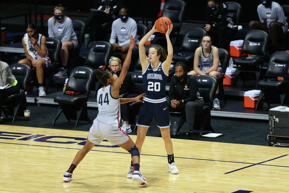 Villanova Wildcats forward Maddy Siegrist (20) defended by UConn Huskies forward Aubrey Griffin (44) during the women's Big East Conference Tournament semi-final between Villanova Wildcats and UConn Huskies on March 7, 2021, at Mohegan Sun Arena in Uncasville, CT. 