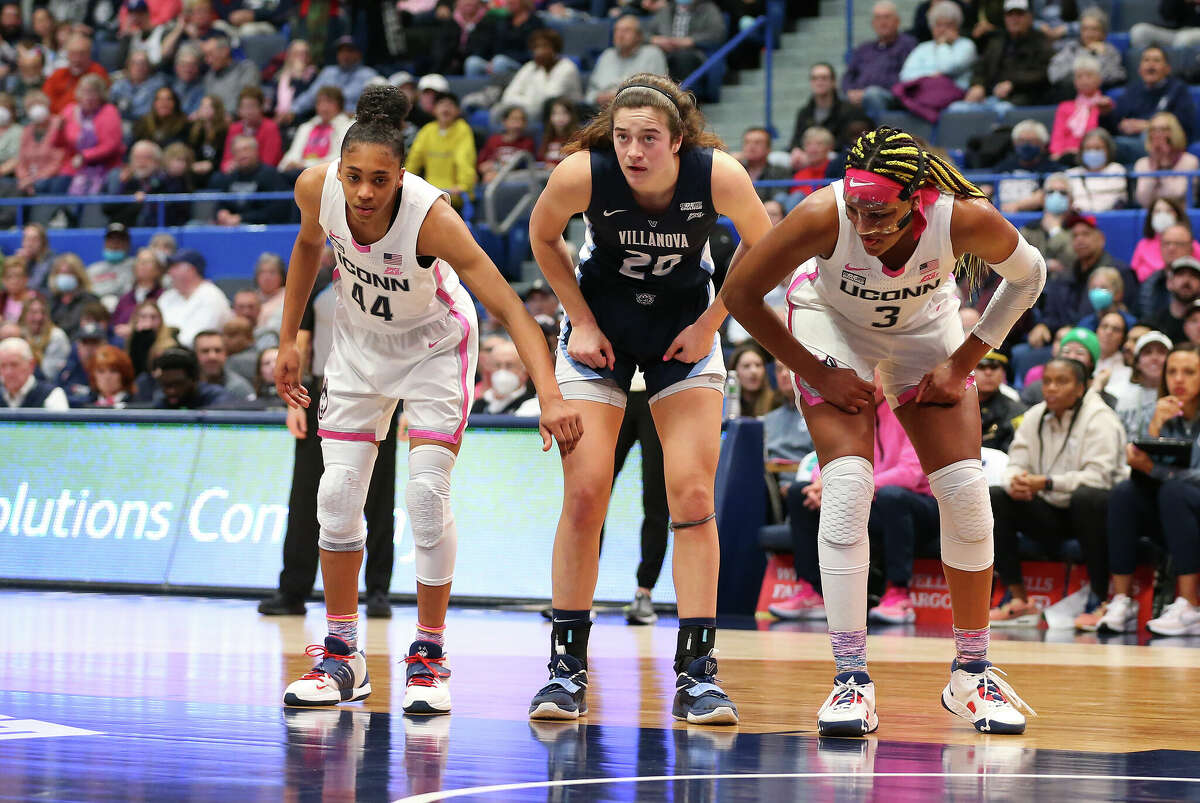 UConn Huskies forward Aubrey Griffin (44), Villanova Wildcats forward Maddy Siegrist (20) and UConn Huskies forward Aaliyah Edwards (3) in action during the women's college basketball game between Villanova Wildcats and UConn Huskies on January 29, 2023, at XL Center in Hartford, CT. 