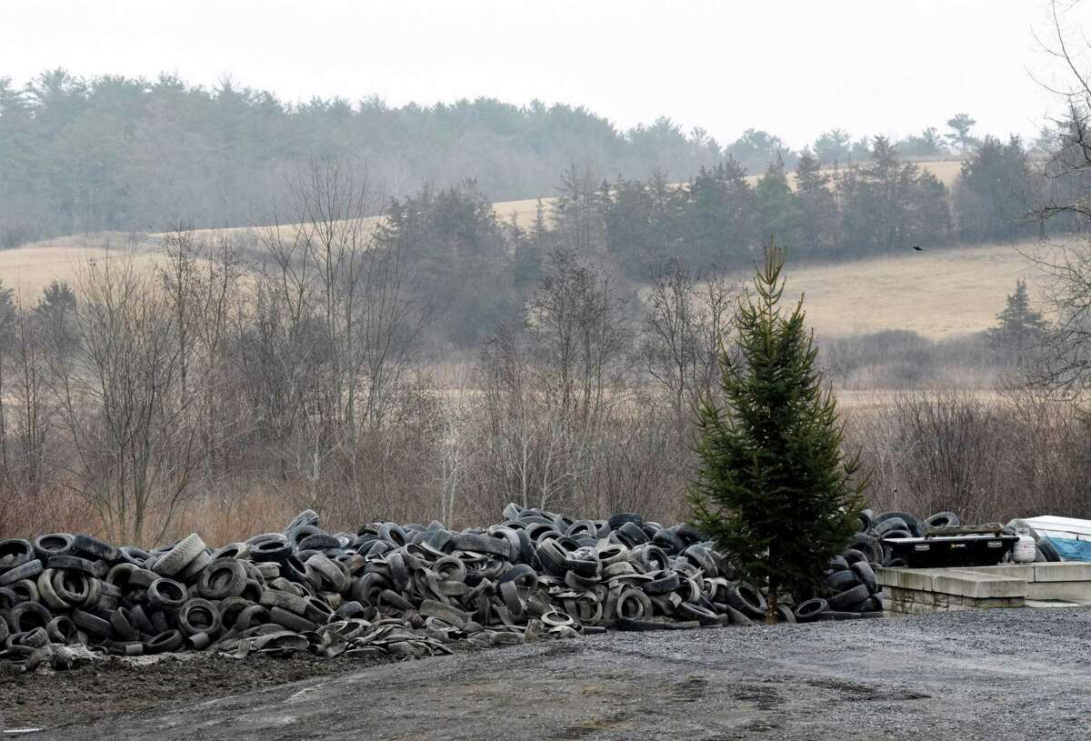 Old tires are stored at an unlicensed tire dump on Route 81 on Friday, Feb. 17, 2023, in Coxsackie, N.Y.