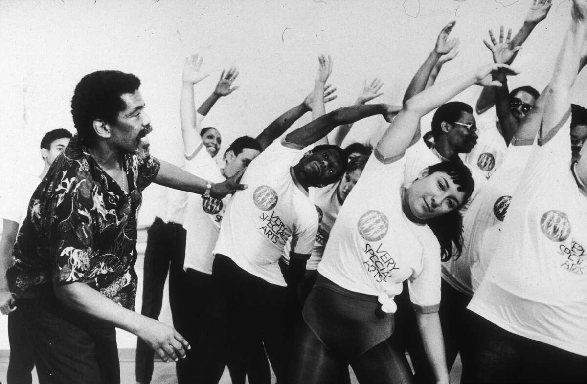 American dancer and choreographer Alvin Ailey instructs students during a class for the blind and visually impaired in New York City on July 30, 1986. Ailey founded the Alvin Ailey American Dance Theater. 