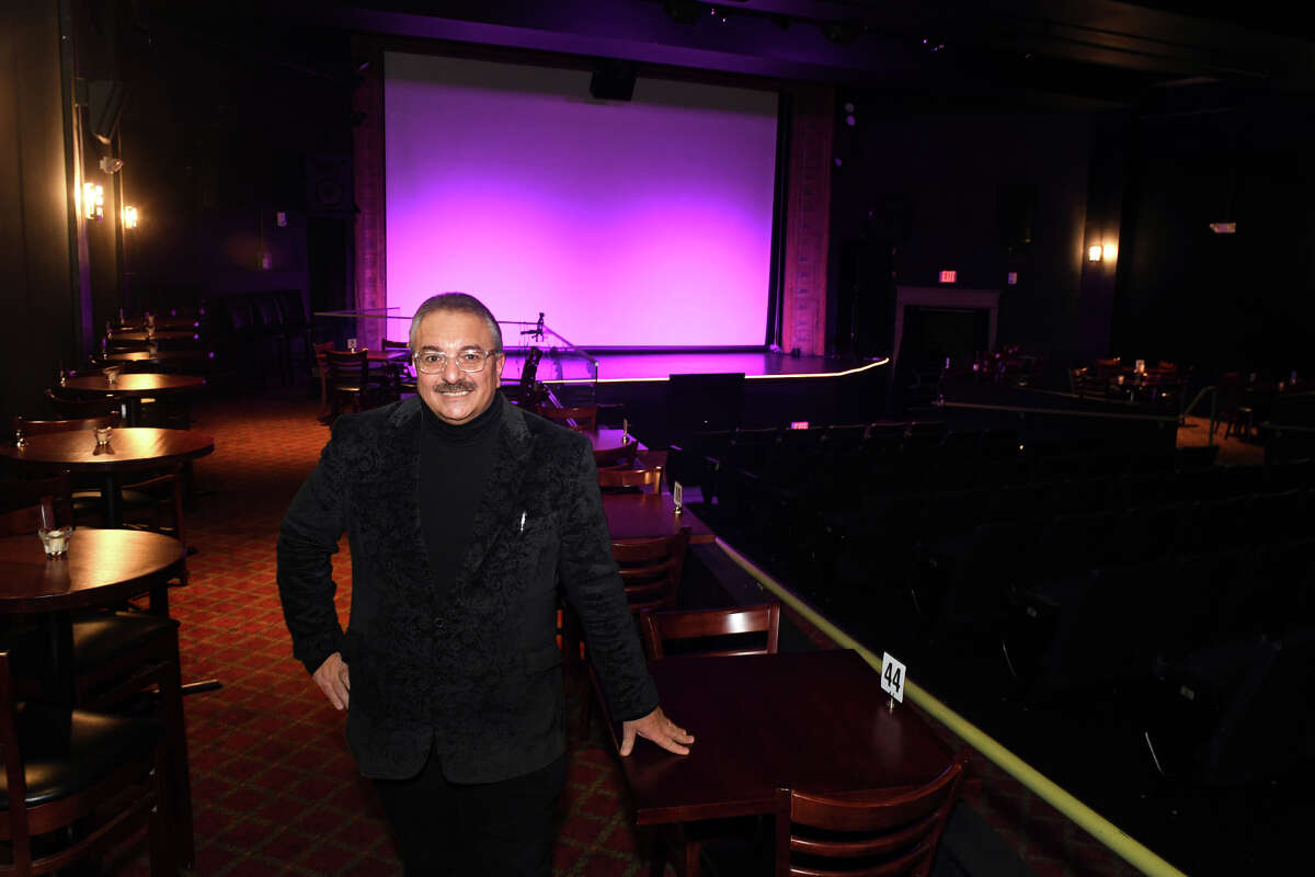 Star Factory owner Louis Zayas poses inside the Bijou Theatre, in Bridgeport, Conn. Feb. 17, 2023. Zayas has take over ownership of the Bijou.