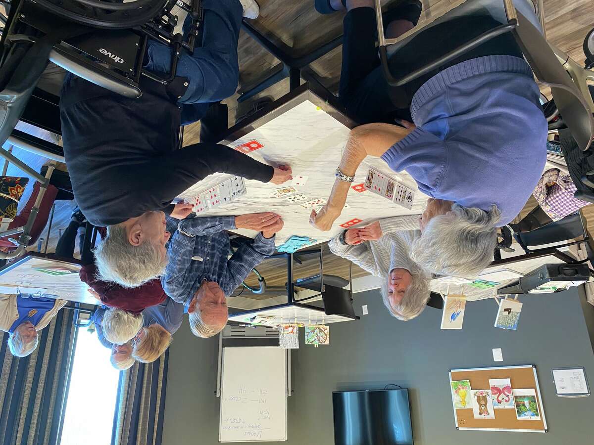 As more active and former Bridge players join the Ridgefield Station community, the game is rising in popularity. From left, Ridgefield Station residents Naomi Stern, Patti McEvoy, Warren Elliott and June Castle are photographed enjoying a game of Bridge.