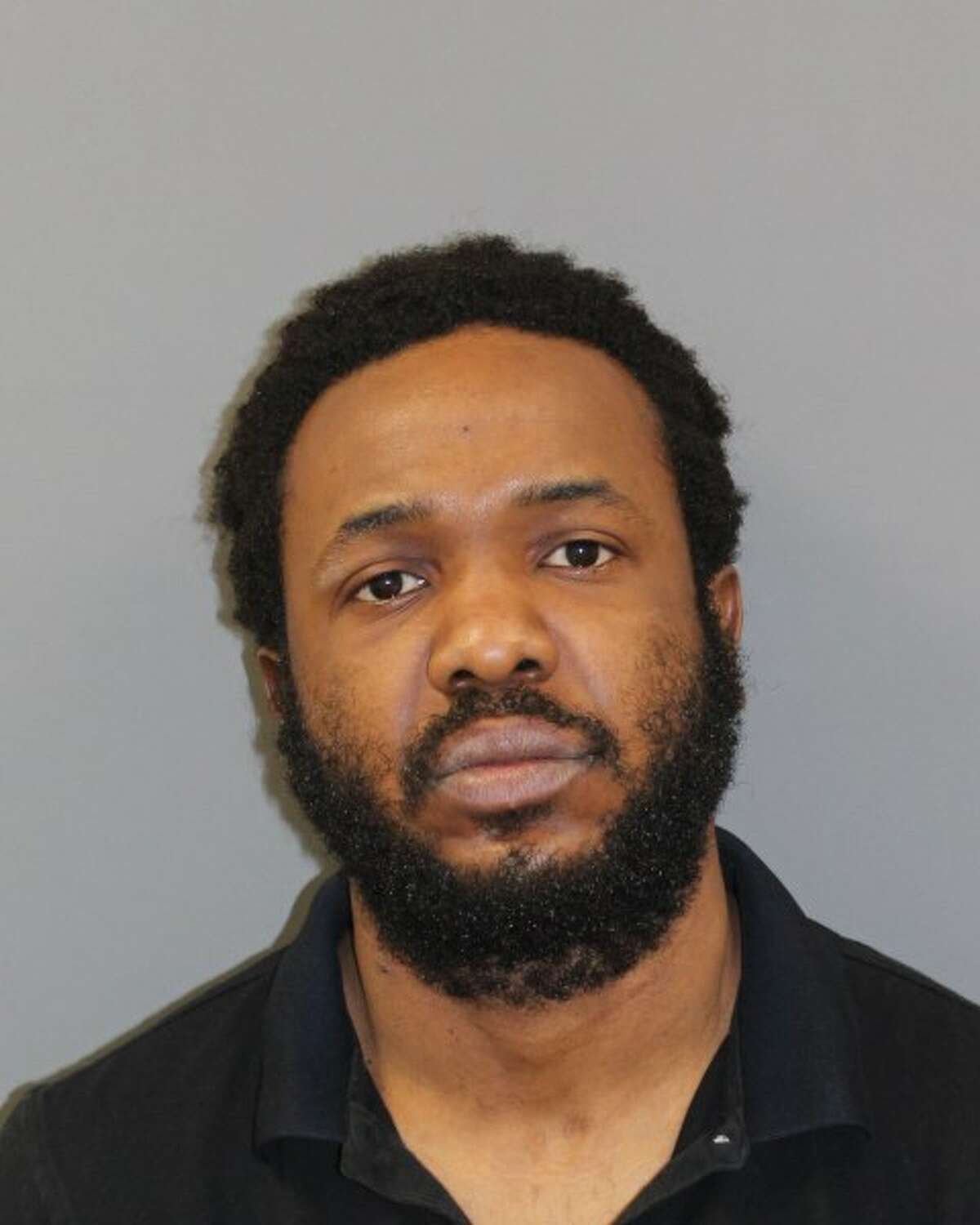 Damion Davis, 35, of Hartford, repeatedly stabbed a 23-year-old woman he was likely stalking after breaking into an Oakland Street home Thursday night, according to Manchester police.