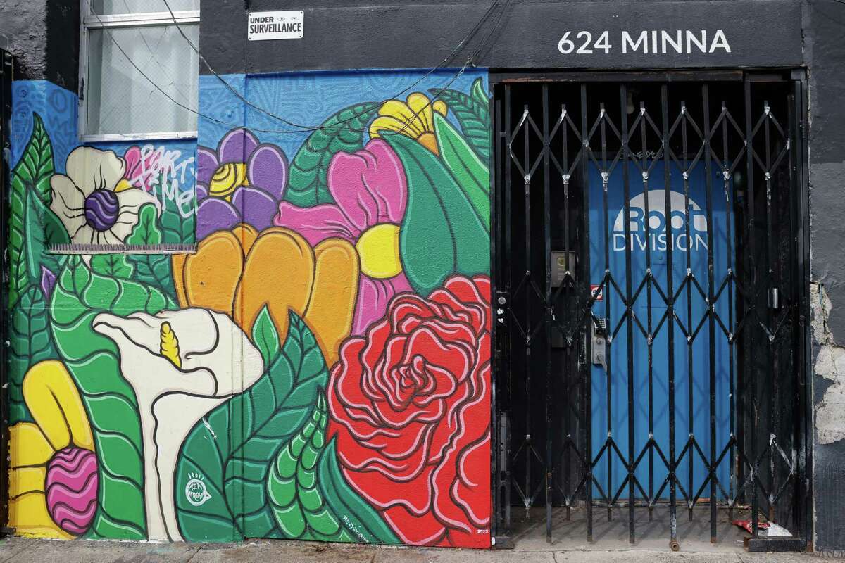 A mural painted in memory of Victorria Moran-Hidalgo by Aik Brown, Root Division teacher and artist, is seen in front of the Root Division office on Minna Street in San Francisco. Moran-Hidalgo was found dead  in a lot on Minna Street on Feb. 18, 2022.