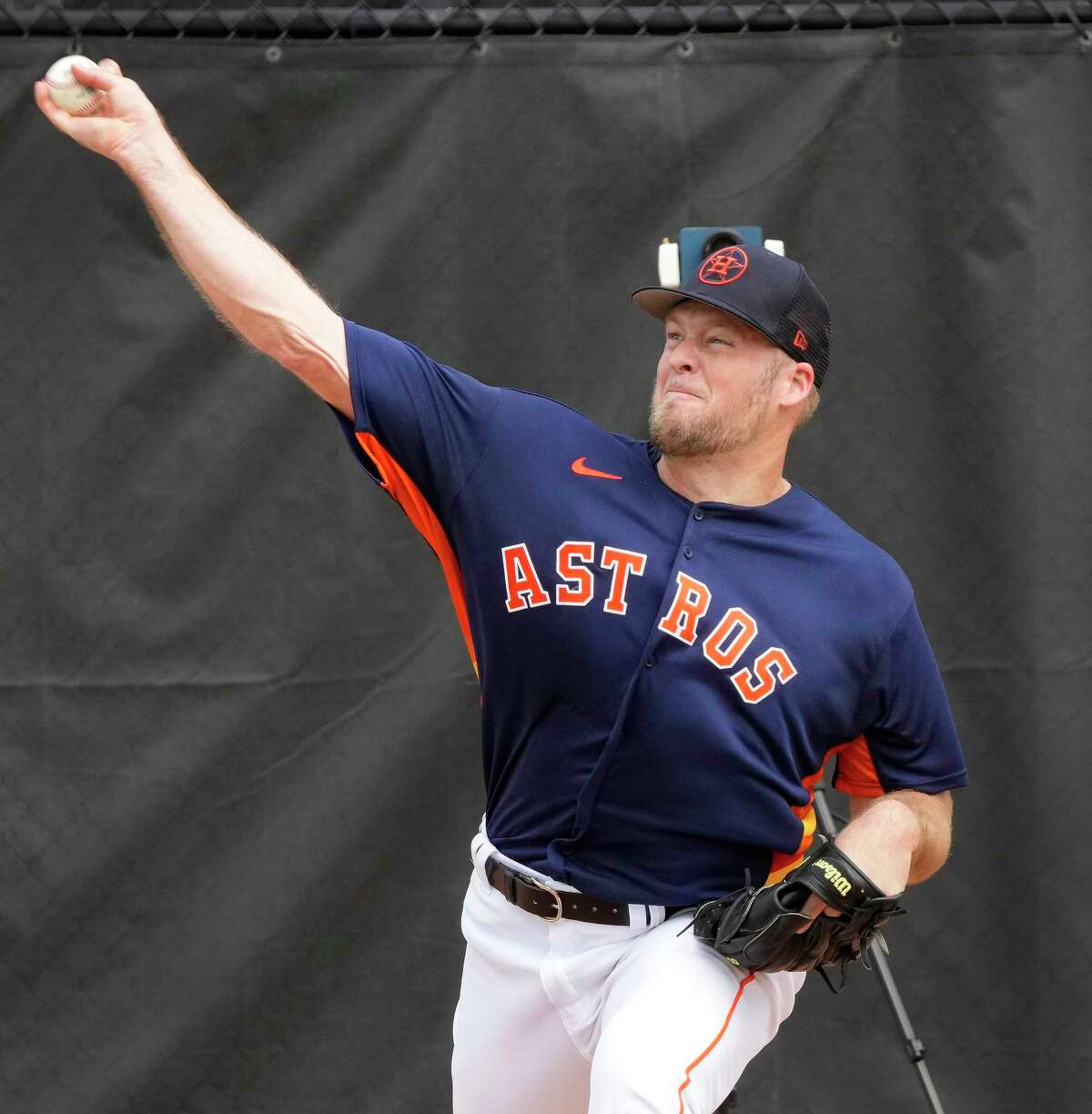 Houston Astros pitcher Ty Buttrey (51) pitches during workouts for pitchers and catchers at the Astros spring training complex at The Ballpark of the Palm Beaches on Friday, Feb. 17, 2023 in West Palm Beach .