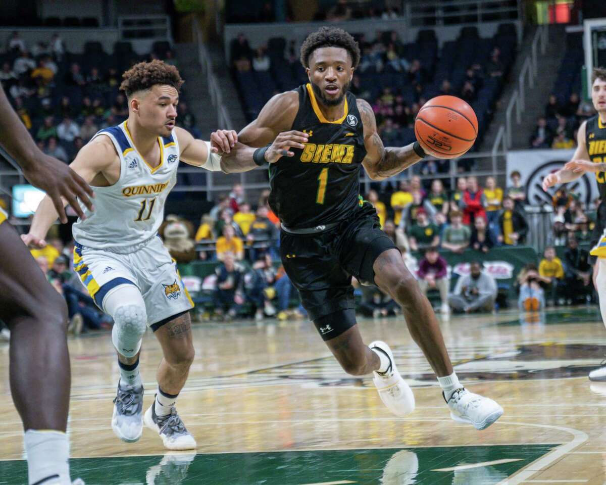 Siena sophomore Jared Billups drives to the basket in front of Quinnipiac junior Dezi Jones on Friday, Feb. 17, 2023, at MVP Arena in Albany, NY.