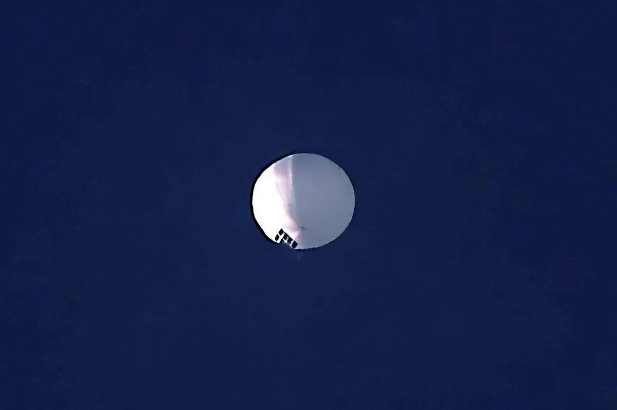 FILE - A high altitude balloon floats over Billings, Mont., Feb. 1, 2023. (Larry Mayer/The Billings Gazette via AP, File)