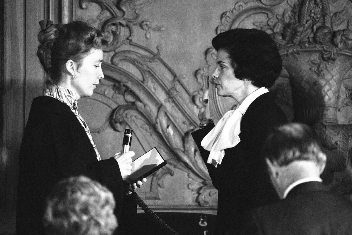 Chief Justice Rose Bird of the California State Supreme Court administers the oath of office to Dianne Feinstein as mayor of San Francisco, succeeding the slain George Moscone, in December 1978.