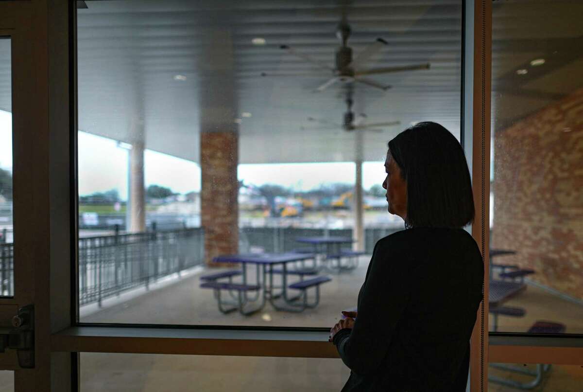 Principal Julie May looks at ongoing construction Feb. 7 at Rogers Middle School, which is converting to an all-honors model focused on college readiness. Public school districts have embraced the reality that parents can choose their kids’ schools and are refining and expanding the available options.