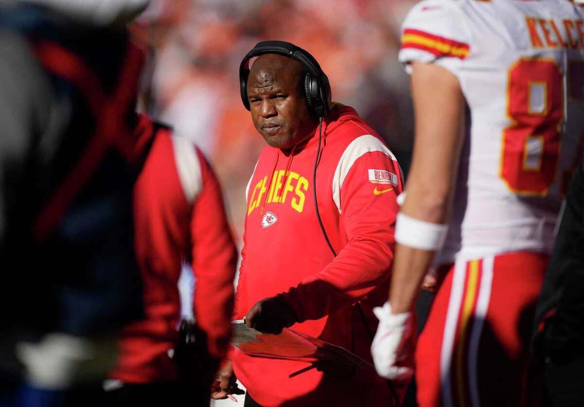 Kansas City Chiefs offensive coordinator Eric Bieniemy watches during the first half of a game against the Denver Broncos on Dec. 11, 2022, in Denver. Bieniemy has agreed to be the Washington Commanders’ offensive coordinator and assistant head coach, the team announced Saturday.